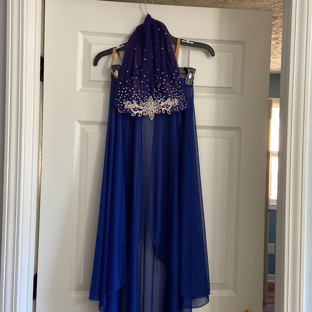 Custom beaded halter top with matching sheer skirt.